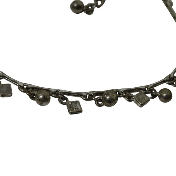 Silver Tone Charm Style Bracelet With Dangling Beads and Geometric Shapes - Picture 2 of 4
